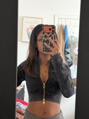 Daisy Black Ribbed Zip-Front Crop Top with Gold Hardware